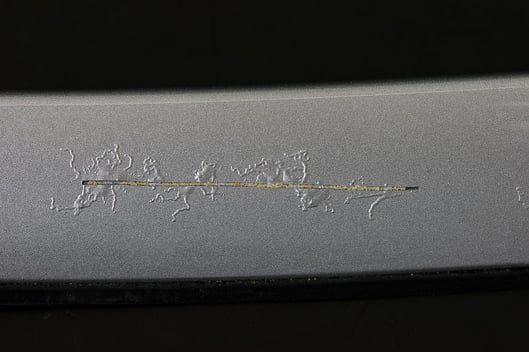Filiform corrosion on a painted metal surface