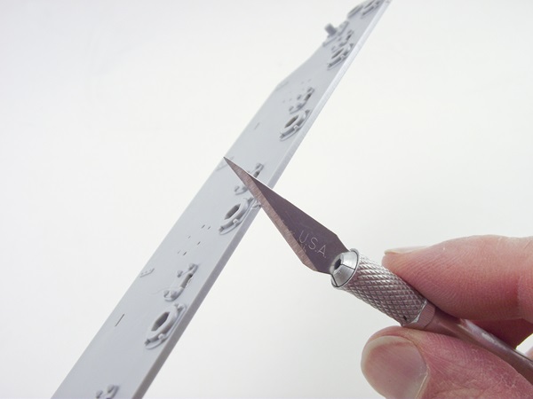 Trimming excess polypropylene weld