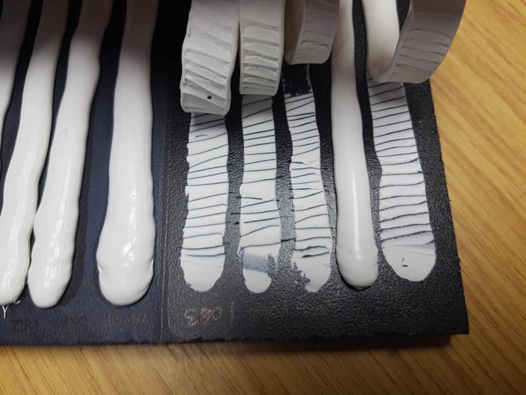 Cut and peel testing of adhesives